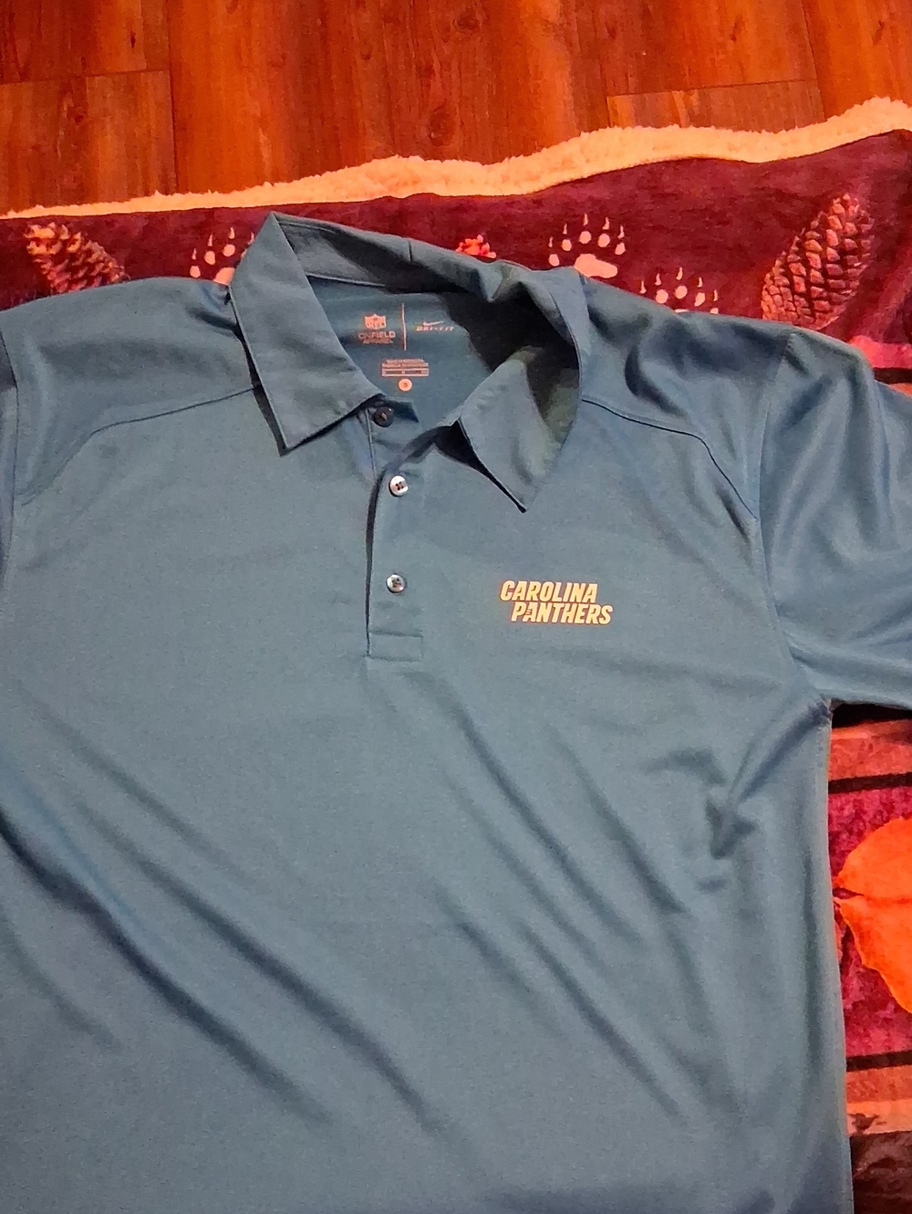 Carolina Panthers Men's Polo Shirt in Teal Blue